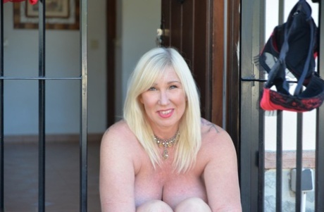 roxy taggart gets a fat load shot on her all natural saggy tits free porn pics