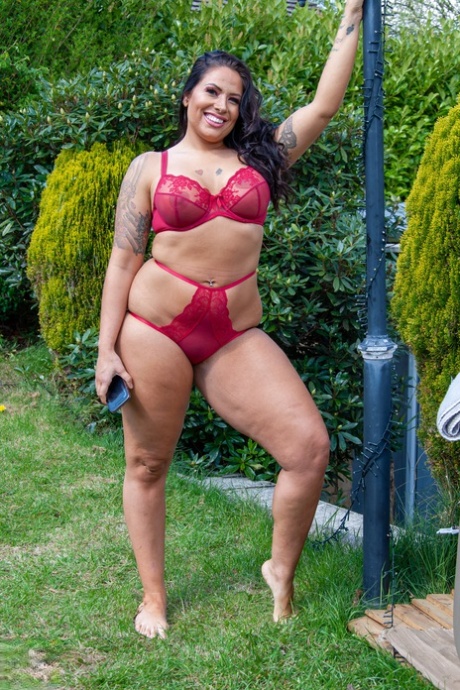 bbw masturbates pushes a dildo in her pussy sexy photo