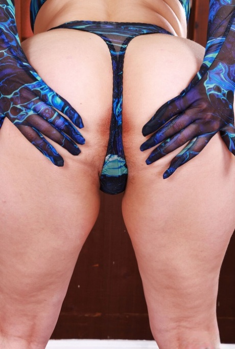 german bbw samantha teasing in black stockings on the bed naked pics